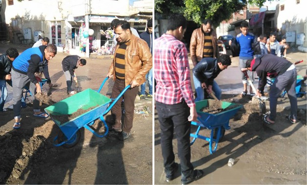 حملات نظافة وتجميل الشوارع والميادين بمدينة طهطا فى سوهاج