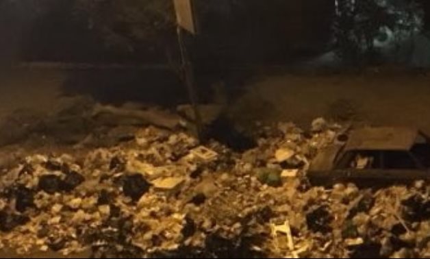 قارئة تشكو من انتشار القمامة بشارع الدكتور سيد صبرى بمدينة نصر