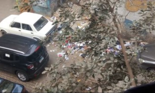 شكوى من انتشار القمامة بميدان سعد الدين العراقي فى الجيزة