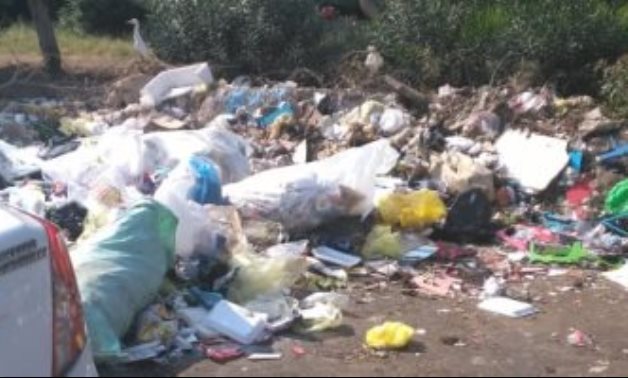 قارئة تشكو من انتشار القمامة بشارع أحمد الزمر فى مدينة نصر
