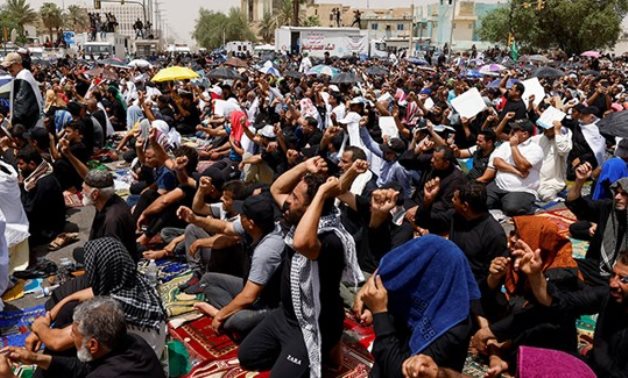 العمليات المشتركة العراقية تعلن حظر تجوال ببغداد وتطالب المتظاهرين بالانسحاب