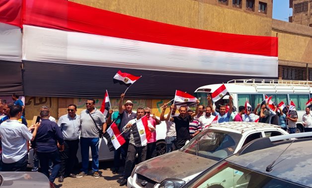 أعلام مصر تزين المشهد الانتخابي واحتشاد المواطنين أمام لجان إمبابة في أجواء وطنية حافلة