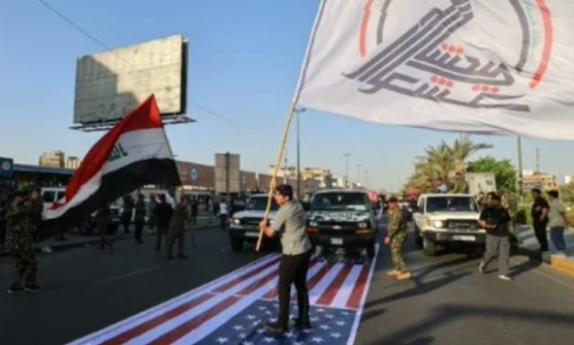 القوات المسلحة العراقية تعتقل متهمين بالإساءة إلى العلم الأمريكي في بغداد