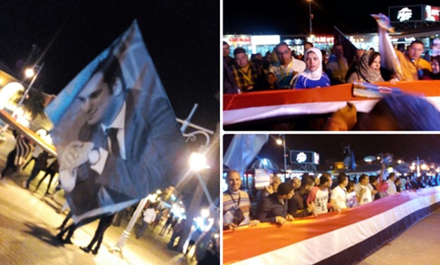 بالصور..  أعضاء مستقبل وطن يحملون علم مصر بطول 100 متر وصورة بدران فى مسير بالغردقة