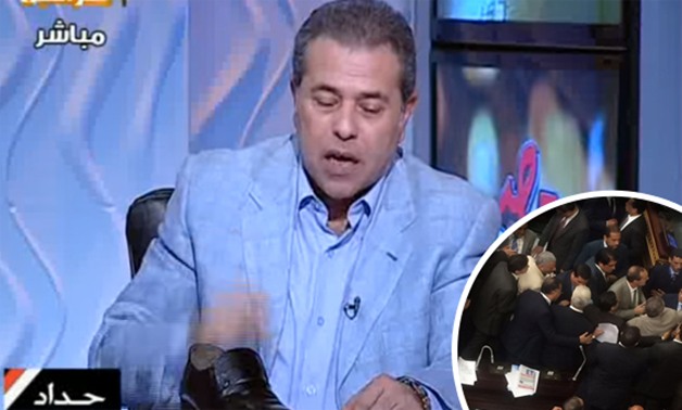 توفيق عكاشة رفع "جزمته" على شاشة التليفزيون فنزلت على رأسه تحت قبة البرلمان (فيديو)
