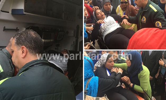 بالصور..نقل فتاة فقدت الوعى إلى المستشفى أثناء تظاهرات حملة الماجستير أمام البرلمان 