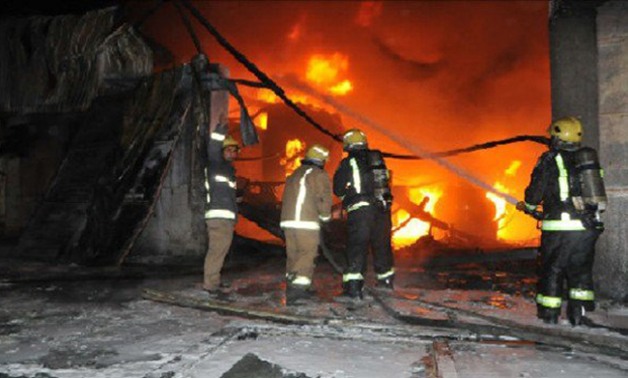 "الإسعاف" تنقل مصابين فى حريق الغورية لمستشفى الحسين الجامعى