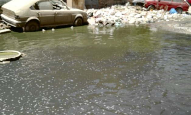 "واتس اب برلمانى".. مواطن يستغيث من غرق شارع بعين شمس بمياه الصرف الصحى