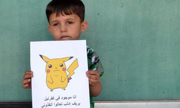 بالصور.. الـ"بوكيمون" وسيلة أطفال سوريا لإنقاذهم من الحصار والدمار