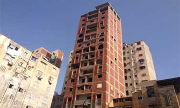 مخالفات بناء أبراج سكنية تتعدى 14 دورا فى شارع بالزقازيق