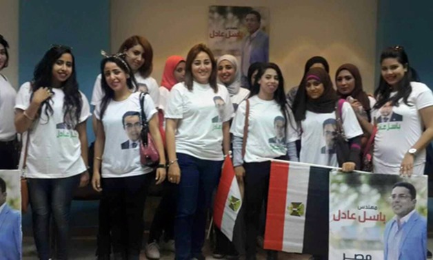 بالصور..حملة باسل عادل تجوب شوارع مدينة نصر.. وترفع شعار"قادمون قادمون"