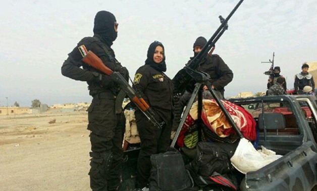 بالصور.. أم هنادى مقاتلة عراقية تقود كتيبة مكونة من 70 رجلا ضد "داعش"