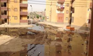 مساكن الشباب بمدينة جهينة تغرق فى مياه الصرف